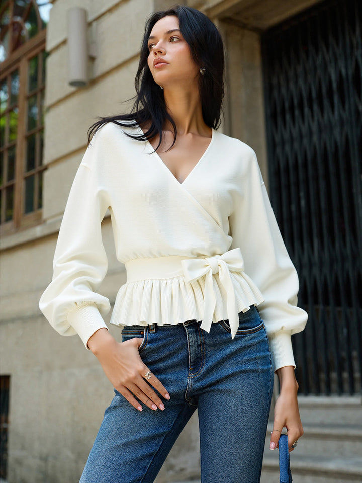 Enya – Strickoberteil mit Schleife und Schößchen