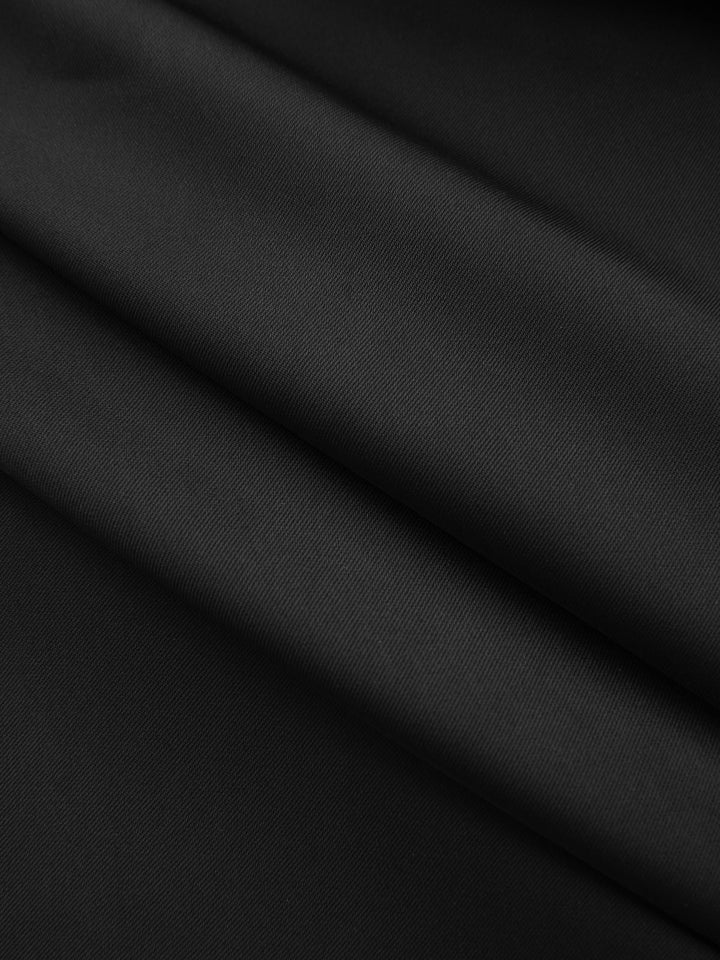 Thea – Satinbluse mit transparenten Ärmeln und gedrehter Vorderseite