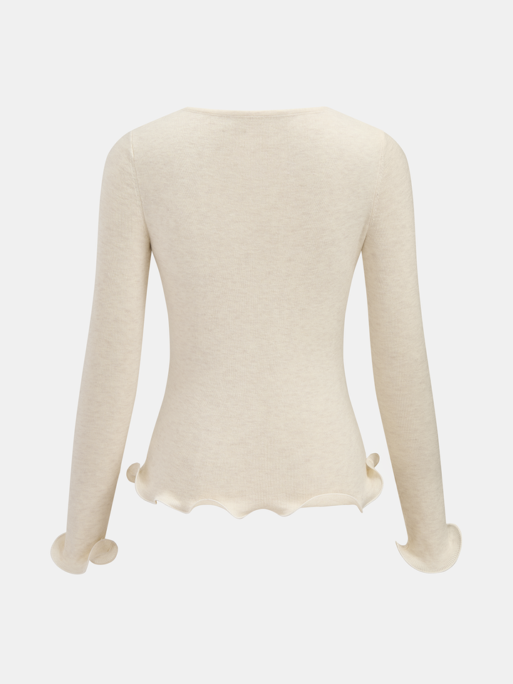 Jessica – Strickoberteil mit 3D-Blumenmuster und gerüschtem Saum